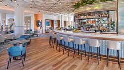The bar and lounge area at Stir, located at the Walt Disney World Swan Reserve