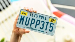 A Muppets themed automobile license plate with the words, ‘Let’s Roll’
