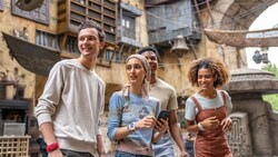 Four Guests walking through Star Wars: Galaxy's Edge
