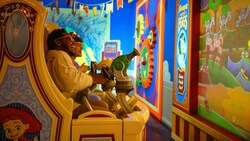 Guests enjoying their turn at the Toy Story Midway Mania attraction in Disney California Adventure Park