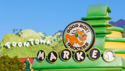 Good Boy Grocers featuring Pluto on a sign in Mickey’s Toontown at Disneyland Park