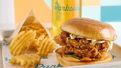 A Chicken Smash Burger with a side of waffle fries from GG's Chicken Shop