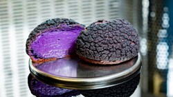 A Cosmic Cream Orb treat filled with whipped raspberry cheesecake