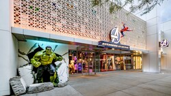 Exterior of Avengers Reserve shop featuring Hulk and Spider Man figures and Super Hero merchandise displays at the Downtown Disney District