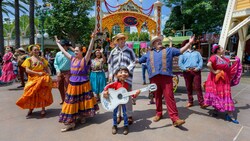 People performing in The Storytellers of Plaza de la Familia Celebrate The Musical World of Coco! show