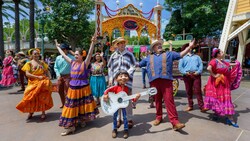 People performing in The Storytellers of Plaza de la Familia Celebrate The Musical World of Coco! show