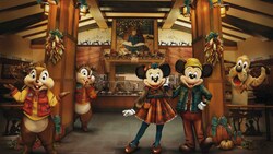 Artist conceptual rendering of Chip n Dale, Minnie Mouse, Mickey Mouse and Goofy wearing autumn outfits inside Storytellers Cafe