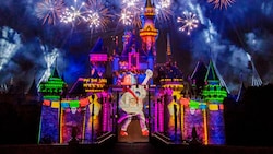 Fireworks and a dazzling projection of Coco on Sleeping Beauty Castle during the Together Forever a Pixar Nighttime Spectacular at Disneyland