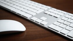  A wireless mouse and keyboard on a desk