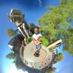 A man posing for a 360 degree photo in Star Wars Galaxy's Edge, raising an arm forward as if to use the Force