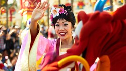  Mulan, Mushu and Cast Members taking part in Mulan's Lunar New Year Procession at Disney California Adventure Park