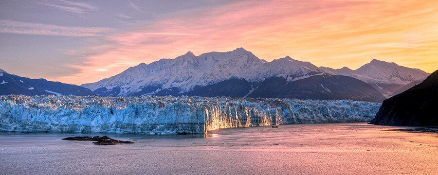 The Hubbard Glacier with snowcapped mountains in the background