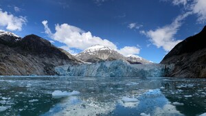Ice covered cliffs along a fjord
