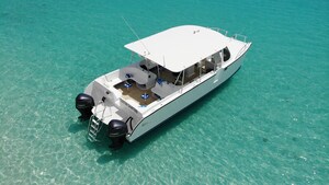 A modern touring boat in the water