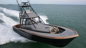A high speed fishing boat sailing through the water