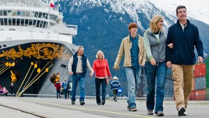A family has disembarked from a Disney Cruise chip to explore