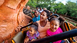 Guests scream in excitement while riding aboard a runaway locomotive on Big Thunder Mountain Railroad