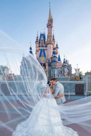 Can You Take Wedding Photos Inside a Disney Park Everything You Want to Know About Disney Wedding Portrait Sessions Disney Weddings