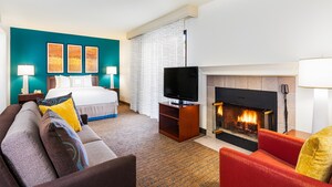 A studio condo suite with open bedroom and  living areas