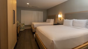 A Standard Room featuring 2 queen beds in the Candy Cane Inn