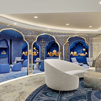 El rincón infantil del Salón Concierge cuenta con detalles inspirados en el Genio, sillas cómodas y un televisor.