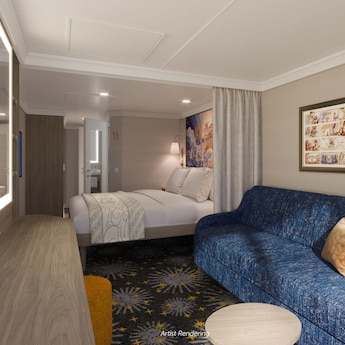 A sofa, wall art, built in shelves, lighted mirror, privacy curtain and queen size bed