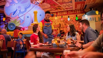Family enjoying a meal at Walt Disney World