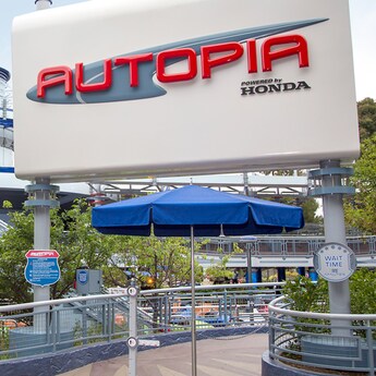The new, Honda sponsored Autopia sign stands over the entrance of this iconic attraction