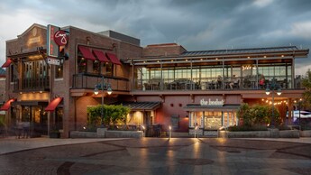 The exterior of Wine Bar George features balcony seating