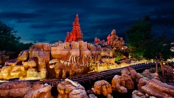 A section of Big Thunder Mountain Railroad with a hairpin curve and a campground