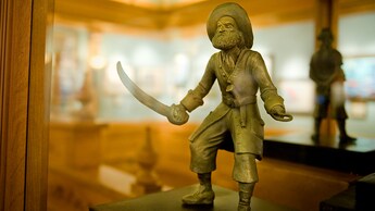 Pirate sculpture from a past show at The Disney Gallery