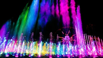 The fountains, lasers and projections at the World of Color nighttime spectacular light up the night sky