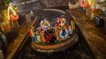 Guests riding Kali River Rapids