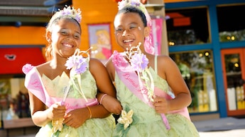 2 girls after their princess makeovers at Bibbidi Bobbidi Boutique in the Downtown Disney area