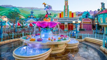 The center of Centoonial Park featuring Mickey and Minnie’s Runaway Railway in Disneyland Park