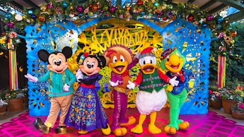 Mickey Mouse, Minnie Mouse and The Three Caballeros wearing Disney Viva Navidad Street Party outfits