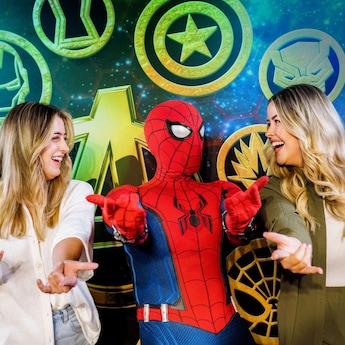 Strike a pose with Spider-Man and other Marvel Super Heroes. Spider-Man and 2 Guests striking a web slinging pose