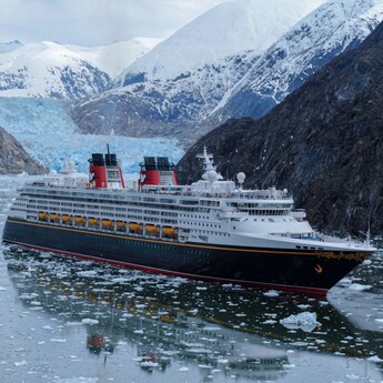 A Disney cruise ship sailing through icy waters