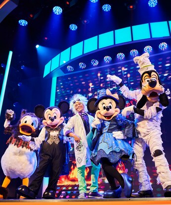Mickey Mouse and friends performing in the Mickey’s Trick and Treat stage show at Disney California Adventure Park