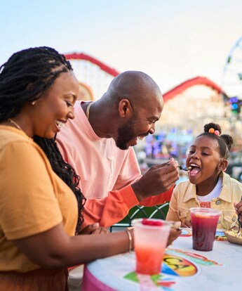 A family enjoying food and beverages at Paradise Gardens Park at Disney California Adventure Park