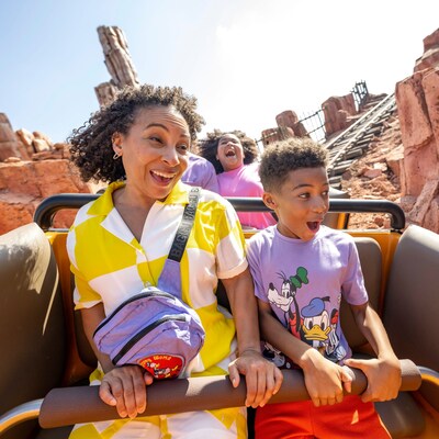 Family Enjoy Big Thunder Mountain Railroad