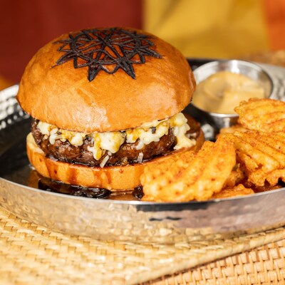 Close-up of a burger and sides at Tiffins Restaurant