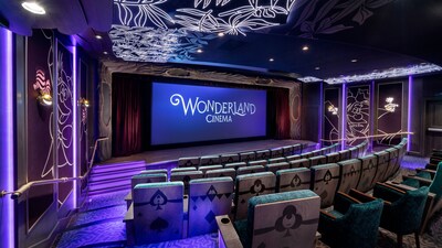 The Wonderland Cinema theater with a screen and chairs on the Disney Wish
