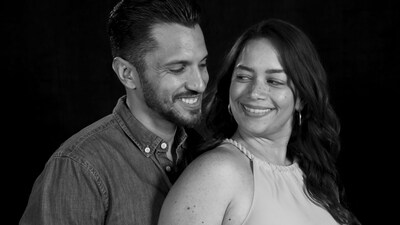 A portrait photo taken at Disney Studio of a couple smiling at each other