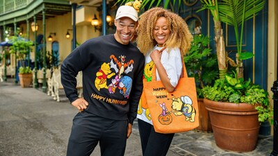 Two Guests wearing Halloween themed Winnie the Pooh apparel