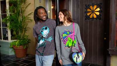 Two Guests wearing Tim Burton’s The Nightmare Before Christmas themed shirts and a handbag