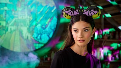 A Guest wearing a Maleficent themed Minnie Mouse ear headband