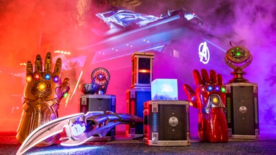 An arrangement of Avengers merchandise, including Thanos’ Infinity Gauntlet, Loki’s scepter, the Tesseract and more