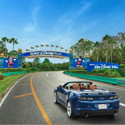 A family drives towards Walt Disney World Resort 
