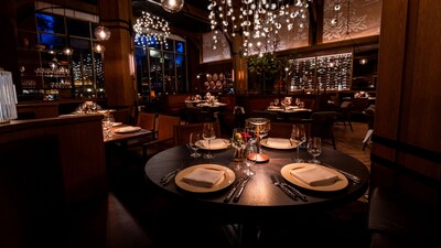 Tables set for service in the main dining room of Napa Rose inside Disney's Grand Californian Hotel
